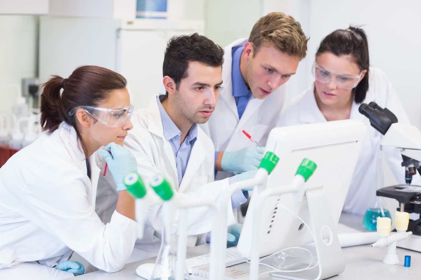 Clinical scientists reviewing electronic data capture records and trial analytics